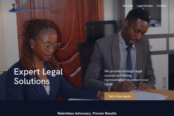 Professional law firm website header showing two attorneys in office working on legal documents with "Expert Legal Solutions" heading.